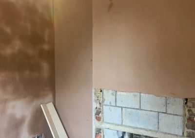 Living room repaired and freshly plastered