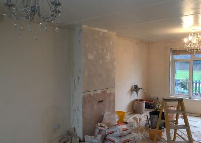 Fireplace and living room ready for plastering