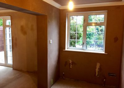 Skim coat plaster applied to walls and artex ceilings