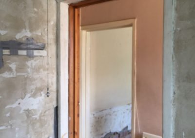 Bathroom wall before repair