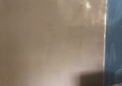 Blocked up doorway fully plastered