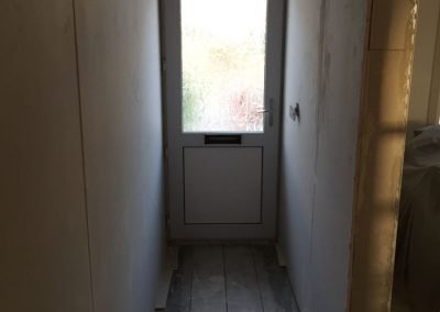 Entrance plasterboarded