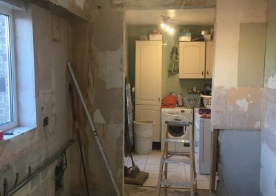Kitchen ready for repair and door closing off